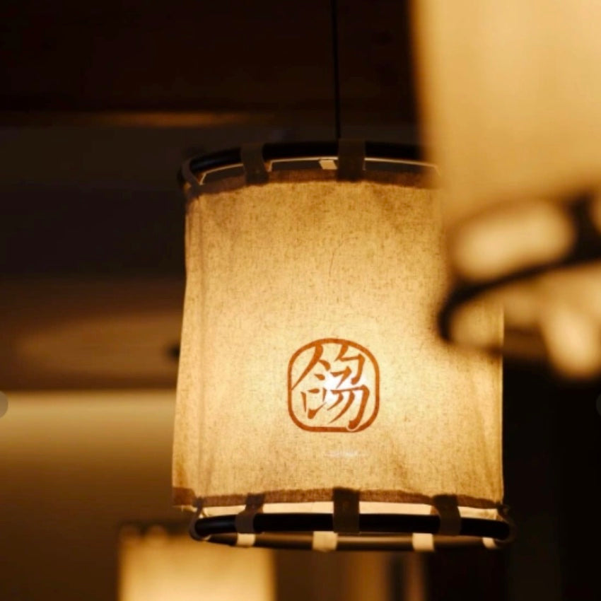 Warm Kyoto lantern light in a quiet interior